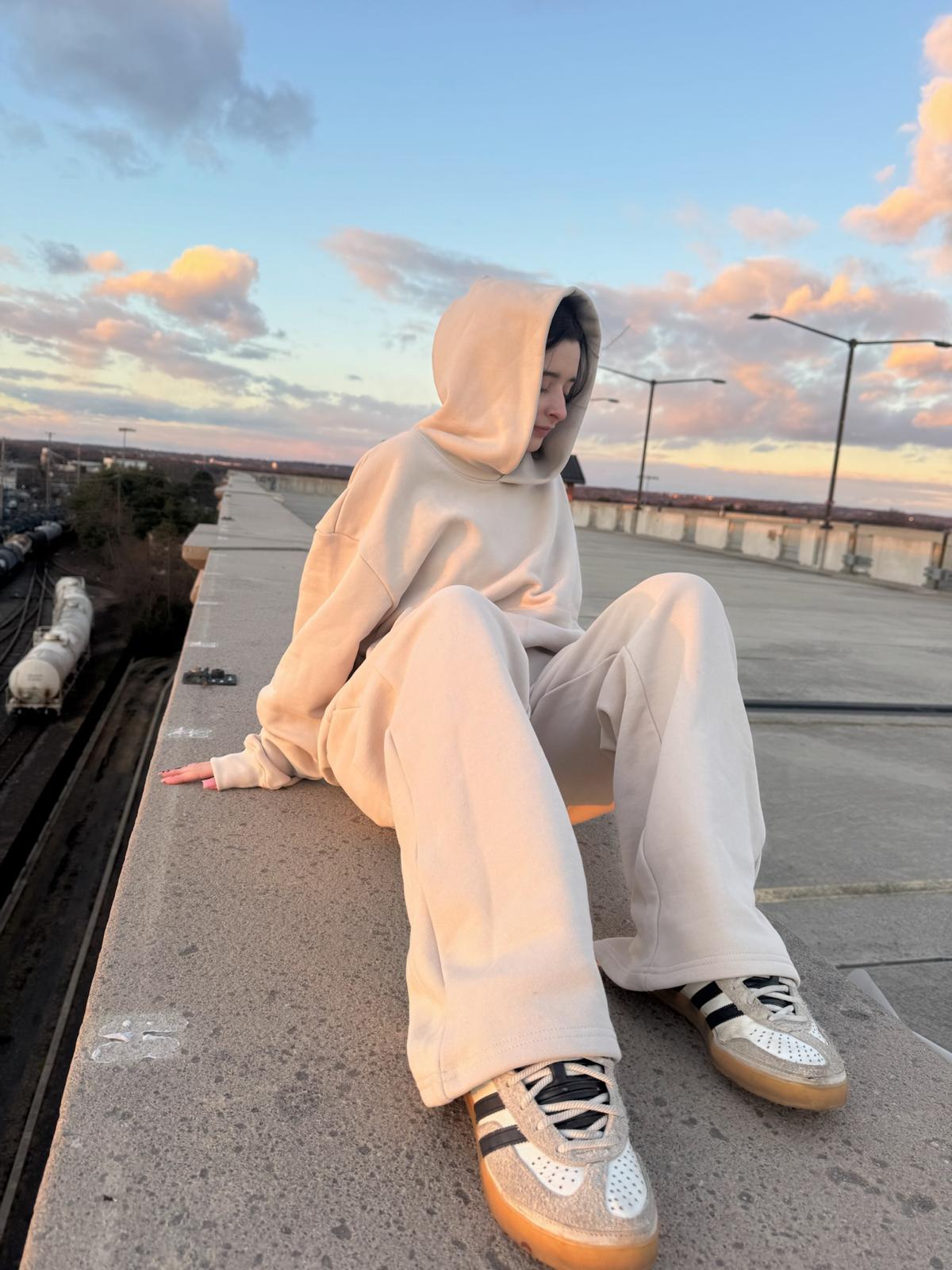 Plain hoodies in heavyweight 480 GSM cotton fleece, beige and black colorway, from Loopback Apparel